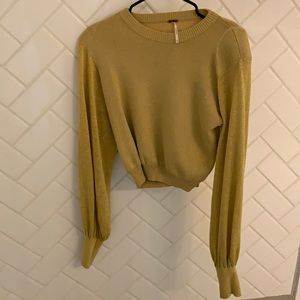 Free people yellow sweater with slight shine.